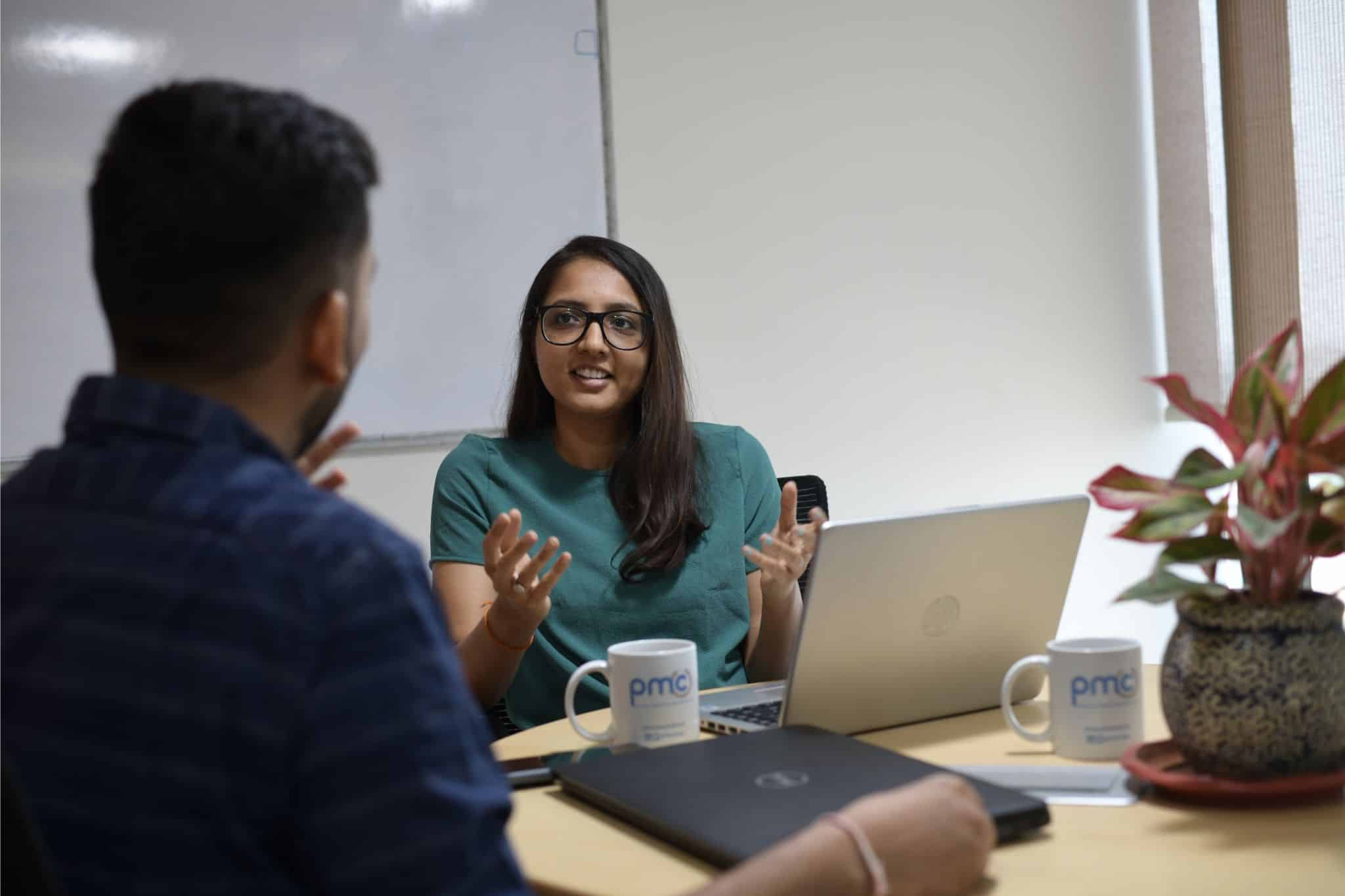 PMC employee in a meeting